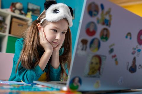 A girl in Ukraine works on schoolwork from home